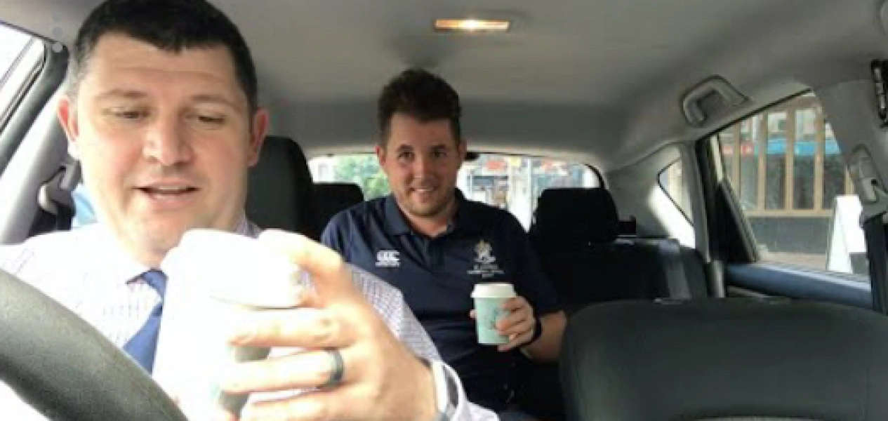 The Chaplain with Teachers in Cars Getting Coffee